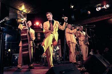 Renowned swing band, The Jive Aces, perform on stage
