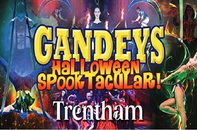 A graphic for the Halloween Spooktacular, with dancers, acrobats and trapeze artists performing incredible stunts 