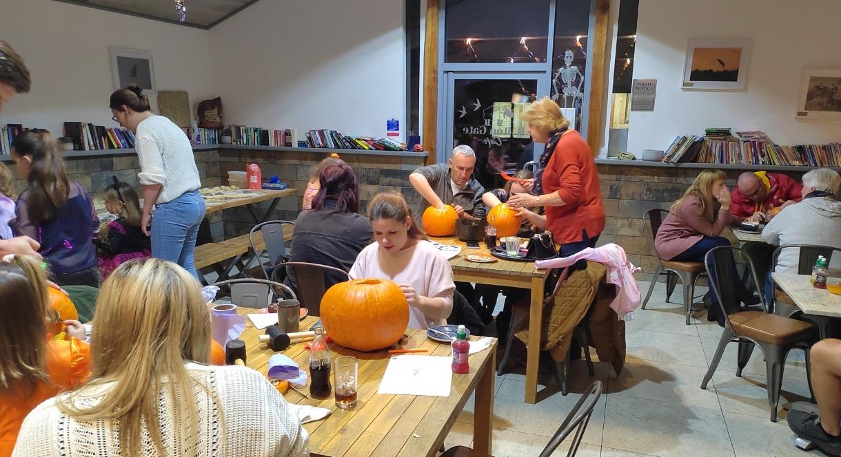 image of a group of people carving pumpkins