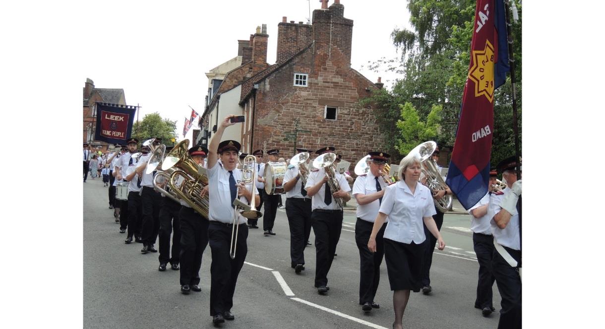 image of a Brass Band walking in the Leek Club Day Procession