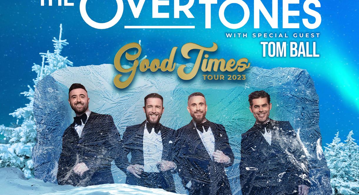 Image shows a promotional poster for The Overtones tour, with the four singers in their tuxedos pictured against a wintry background