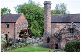 exterior image of the mill wheel and buildings