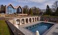The Tawny Hotel's guests can relax in nature and enjoy the heated open-air swimming pool