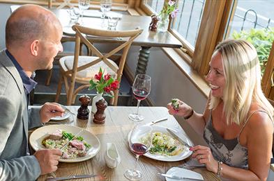 Couple enjoys lunch at The Duncombe Arms (landscape)