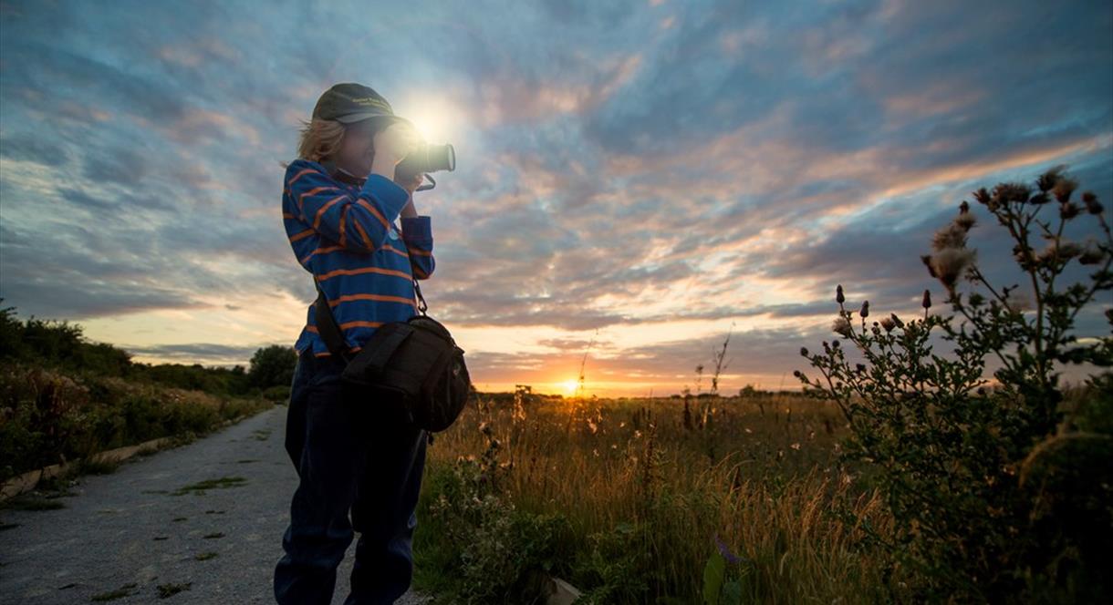 A photographer tests his camera at Middleton Lakes, Staffordshire