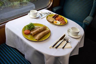 A hearty breakfast awaits you on the beautiful steam train carriages of Churnet Valley Railway, Staffordshire