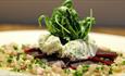 Enjoy a baked beetroot and creamed goats’ cheese starter