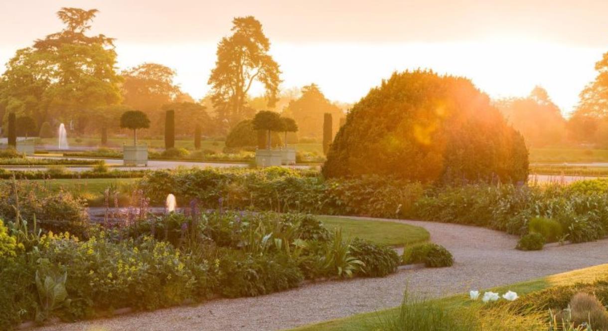 The sun rises above the Italian Gardens at The Trentham Estate, Staffordshire