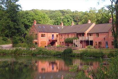 View across the lake to Foxtwood Cottages