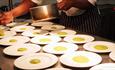 Image shows dishes being plated up in the kitchen at the Hammersley Restaurant, Stoke-on-Trent College