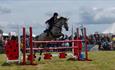 Main ring events at the Manifold Valley Show include showjumping