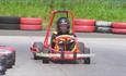 Young lad driving a kart