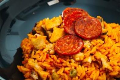 Image shows a tasty-looking paella, ready to eat