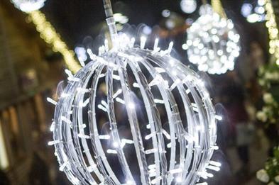Image shows a huge, glittering Christmas decoration at the Shopping Village at The Trentham Estate