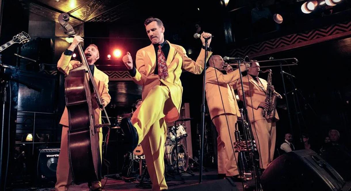 Renowned swing band, The Jive Aces, perform on stage