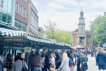 Image shows stalls and shoppers in Newcastle-under-Lyme town centre for the Castle Artisan Market