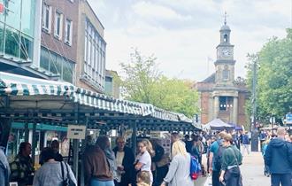 Image shows stalls and shoppers in Newcastle-under-Lyme town centre for the Castle Artisan Market