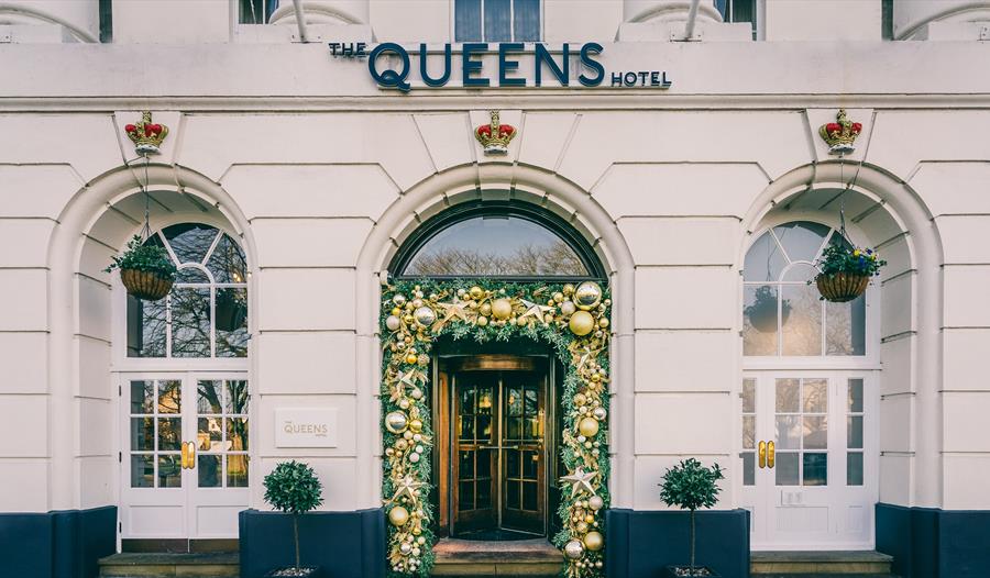 Queens Hotel exterior with Christmas decorated entrance