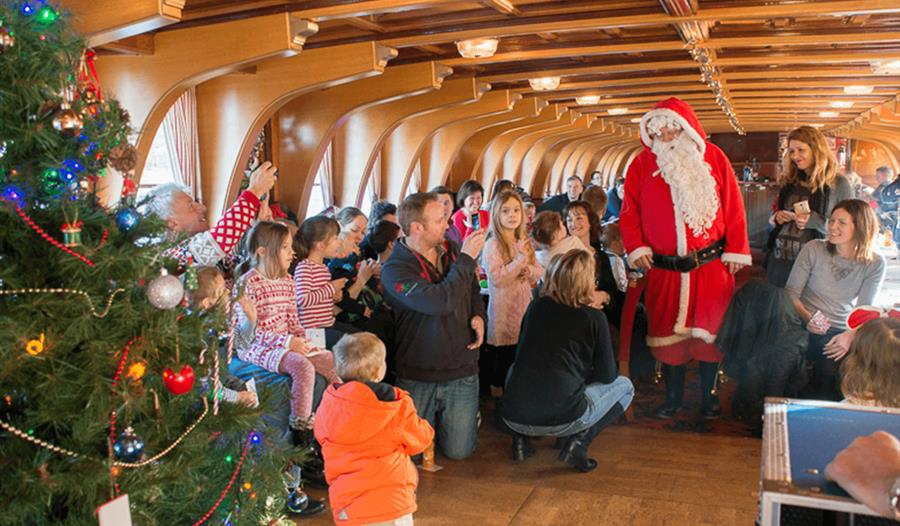 Father Christmas and families on board The New Orleans