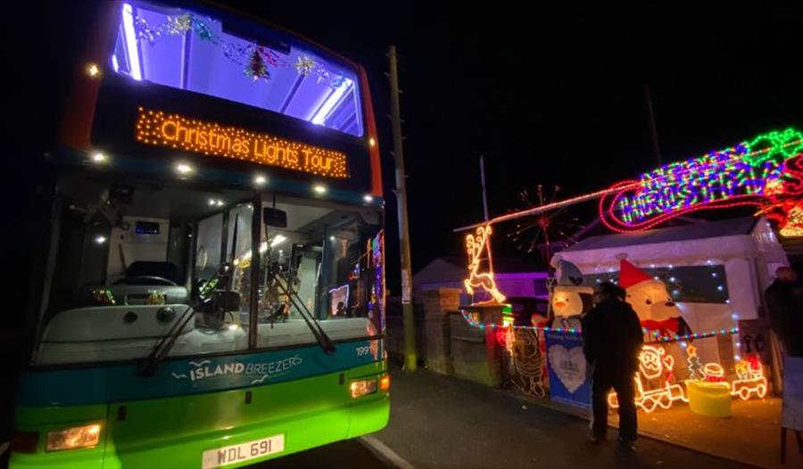 Southern Vectis bus in front of Christmas lights, Isle of Wight, event, what's on