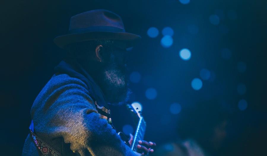 Man playing a guitar