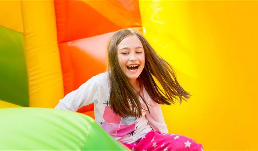 Girl enjoying the bouncy inflatable, Bouncy Barn, Tapnell Farm Park, children's event, what's on