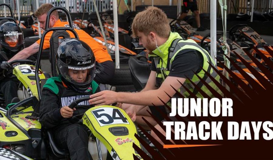 Man helping child with helmet before karting at Wight Karting, Ryde, Children's Events, junior track days