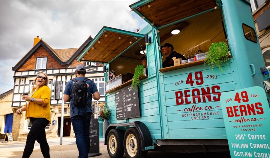 A blue converted horse box coffee shop