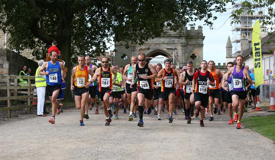 Runners setting off on the trail race