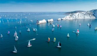 Yachts passing the Needles in the Round the Island Race, Isle of Wight, What's On - Image credit: Paul Wyeth