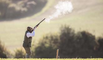 Image of someone clay pigeon shooting at South Causey Inn.
