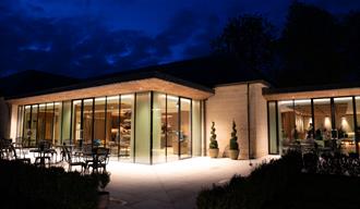 Exterior of the Walled Garden Restaurant at Lucknam Park by night