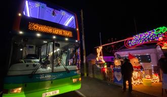 Southern Vectis bus in front of Christmas lights, Isle of Wight, event, what's on