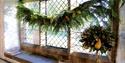 Christmas greenery in the window 2022
