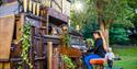woman playing a beautiful organ in located in Bournemouth's garden for the arts festival