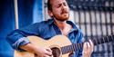 Musician performing at Old City Sounds 2023