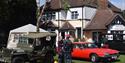 Previous North Weald Airfield Museum vehicles on display outside.
