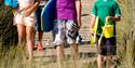 Children walking to the beach