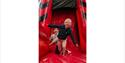 Children having fun on the bouncy castle at Bouncy Barn Fun event at Tapnell Farm Park, children's event, what's on, Isle of Wight