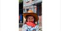 Girl dressed up as a cowgirl at Cowboy Town, Wild West Week, Blackgang Chine, family event, children's activities, what's on, Isle of Wight