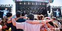 Crowds of people watching an act on the main stage at the Isle of Wight Festival, music, what's on, event