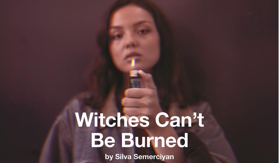 Blurry image: woman with a lighter in her hand