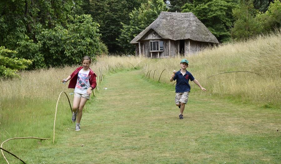 Two children running in the Garden at Killerton
