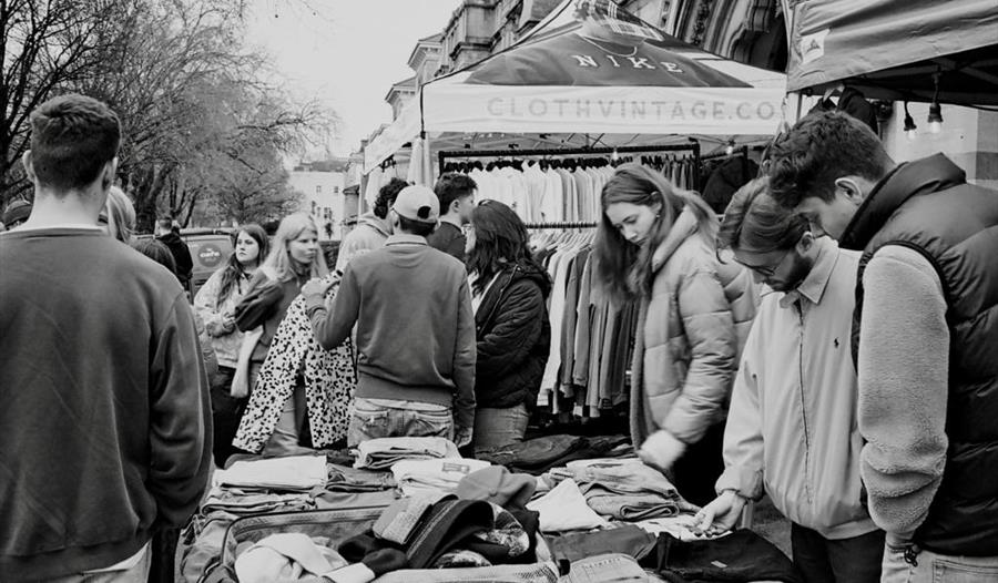 Black and white photo of the clothes market