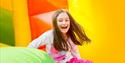 Girl enjoying the bouncy inflatable, Bouncy Barn, Tapnell Farm Park, children's event, what's on