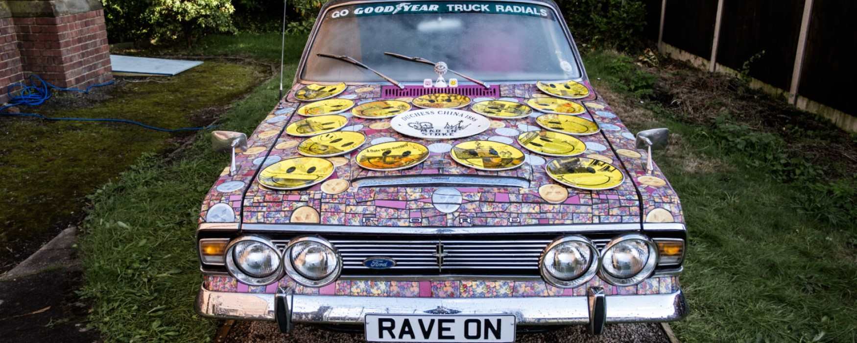 A vintage car decorated in rave ceramics as part of the British Ceramics Biennial 2023