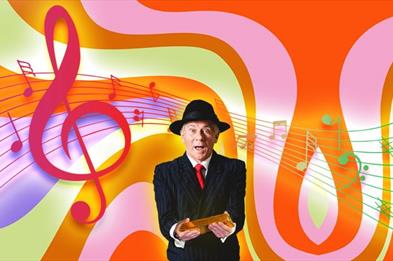 Image of man holding a gold bar