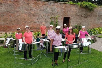 Image of people playing steel drums