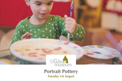 Boy painting a plate