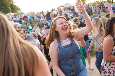 A visitor enjoys great live music at one of The Trentham Estate's Summer Concerts